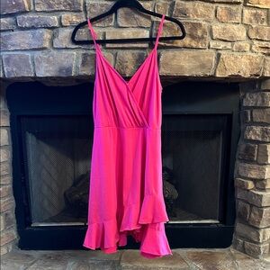 Vibrant Pink Sleeveless Dress With Ruffled Bottom.